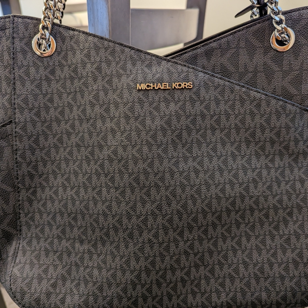 Michael Kors Black Purse with chain/leather strap.